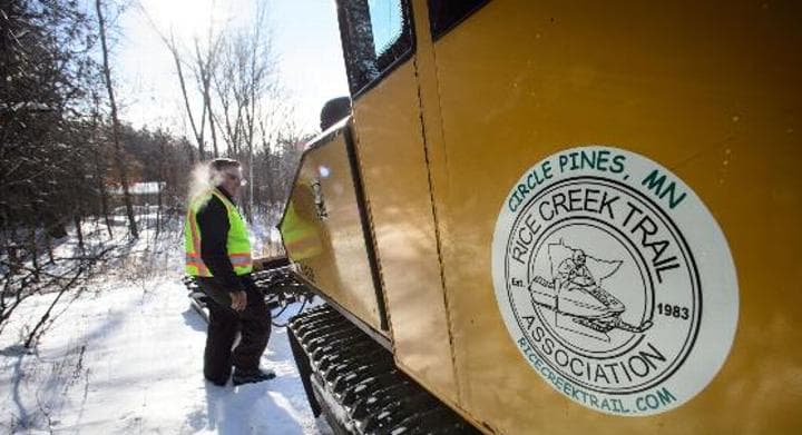 Volunteers maintain Minnesota’s vast network of snowmobile trails