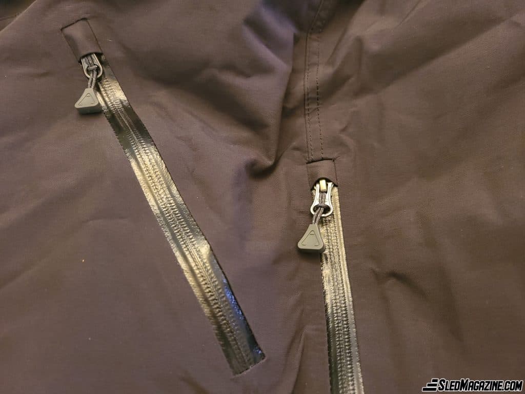 The zippers of the bib overalls are waterproof and prevent ice from forming. They can be easily operated after a long day of snowmobiling.