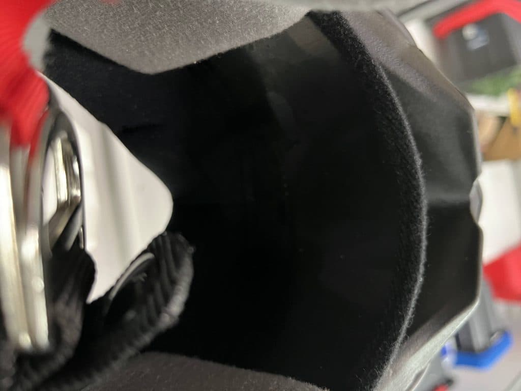 The breath deflector is entirely made of plastic.
