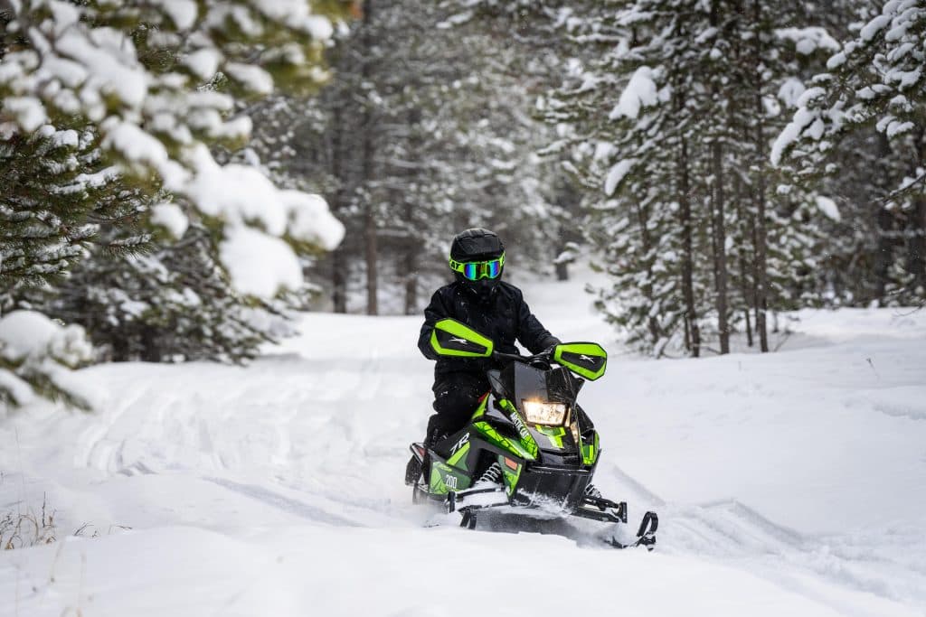 Achild on an Arctic Cat 2025 ZR 200 