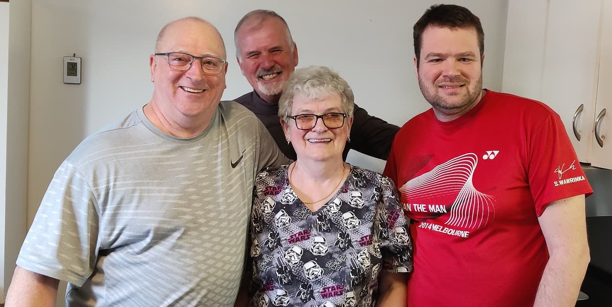 Grandma Carolyn with Denis, Yoland, and Jean-François—starting the day right