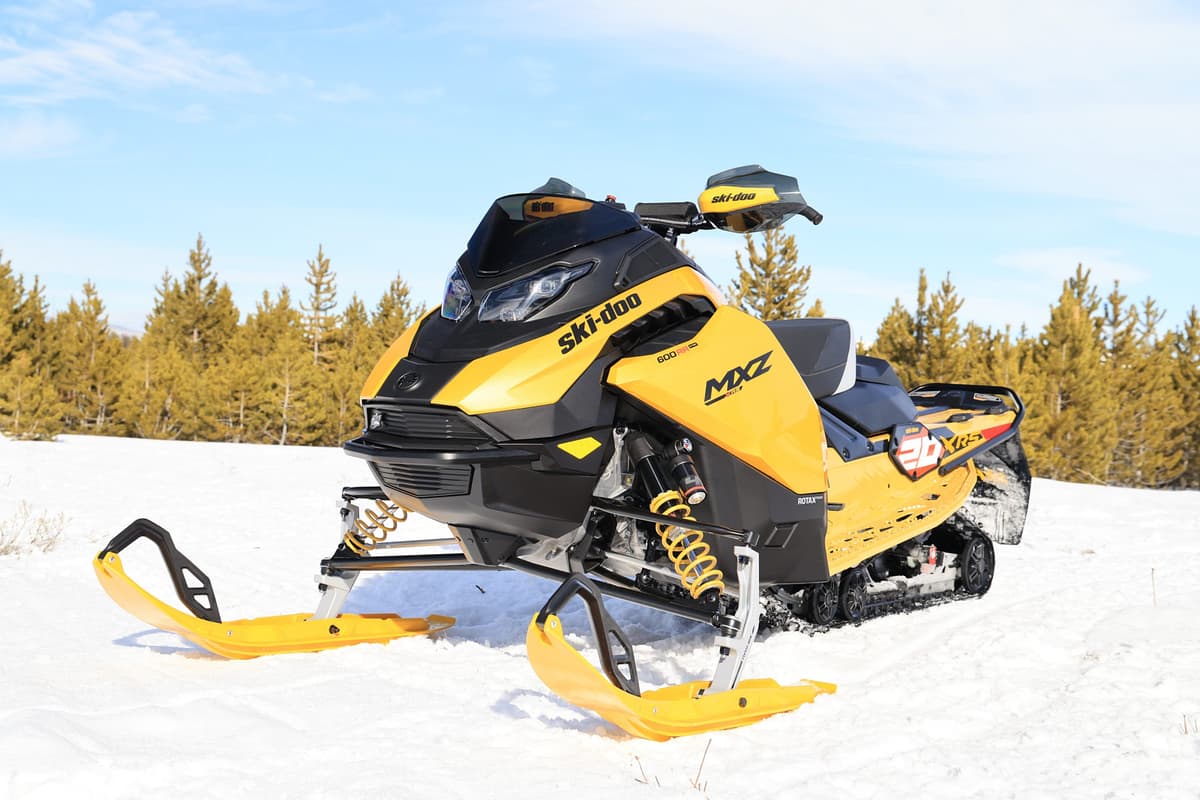 Front suspension detail of 2027 MXZ X-RS 20th Anniversary with RAS RX and Pilot RX skis
