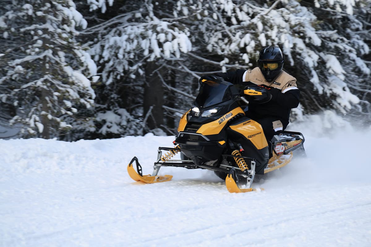 Rear suspension action shot of 2027 Renegade X-RS 900 ACE Turbo R